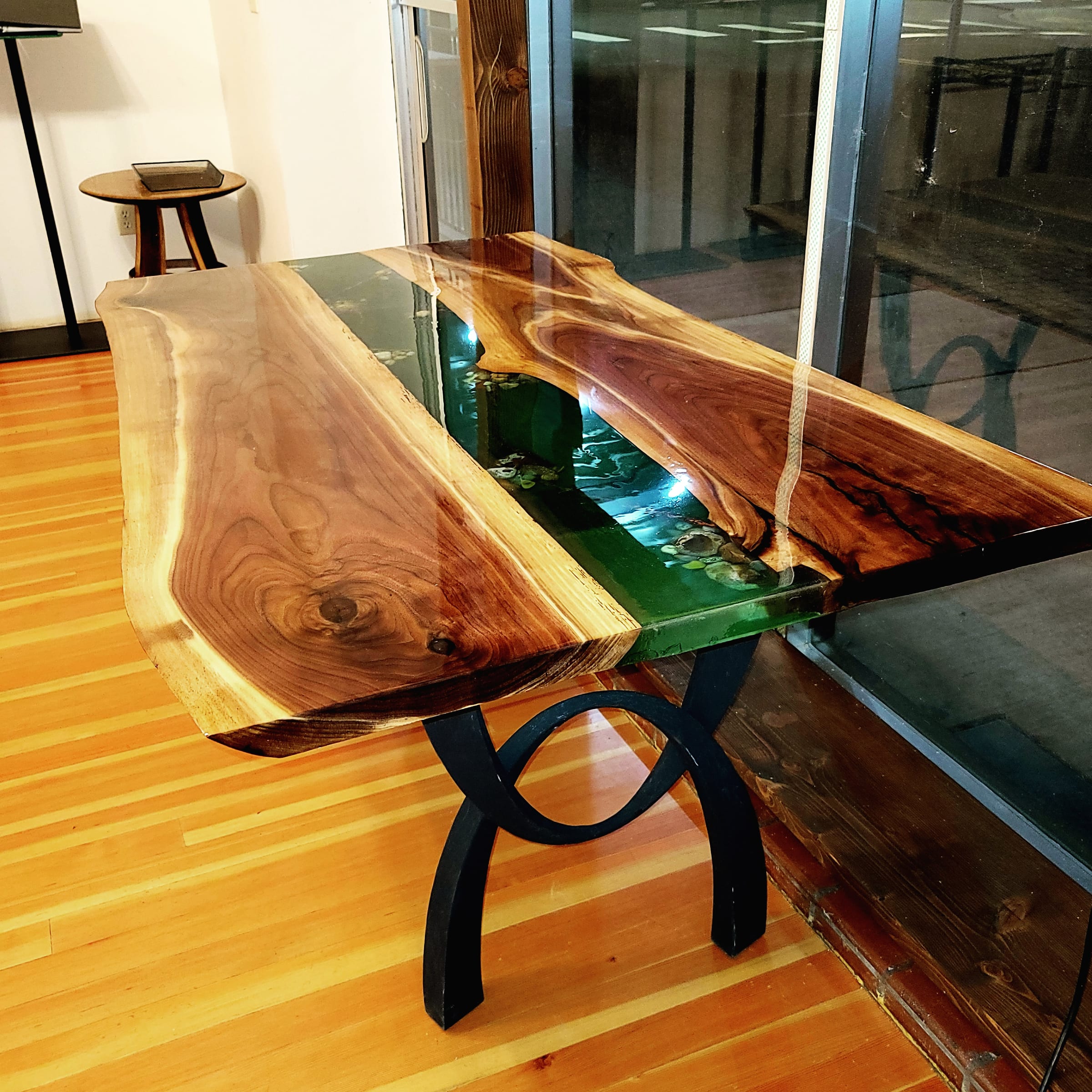 Bookmatched walnut river table with deep green epoxy resin by Ray Sample, Castle Rock CO